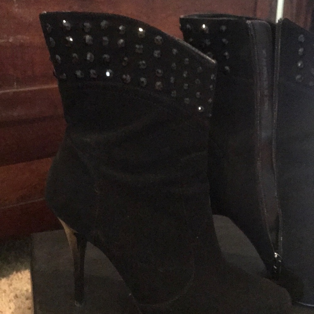 Black high heel booties by Nina